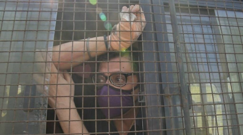 anrab arrested and moving in police van 
